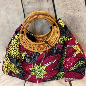 Beautiful printed bag.  Cotton material, wooden handle, change purse included.